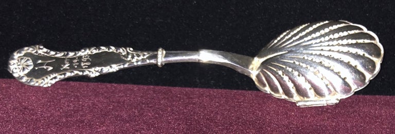 Item #29606 SILVER TEA BALL IN THE FORM OF A SILVER SPOON