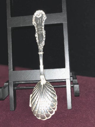 SILVER TEA BALL IN THE FORM OF A SILVER SPOON